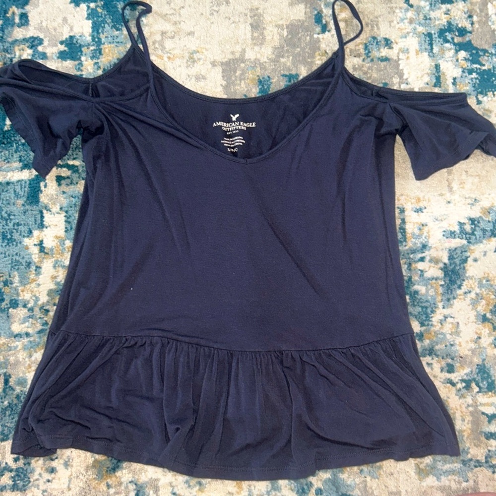 Off-shoulder blue top with bottom ruffles